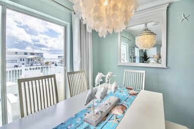 Spectacular peekaboo open water views abound with this updated 2 - photo 9
