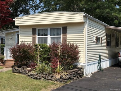 Welcome to Riverwoods a 55 an older community. This home has - photo 1