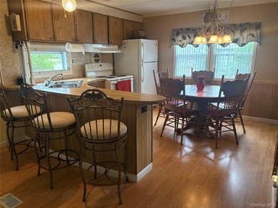 Welcome to Riverwoods a 55 an older community. This home has - photo 2