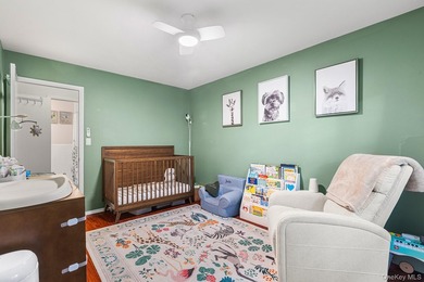 Spacious and versatile apartment featuring an extra-large living - photo 9