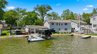 Arrive at this beautifully updated lake home and immediately - photo 1