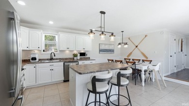 Arrive at this beautifully updated lake home and immediately - photo 10