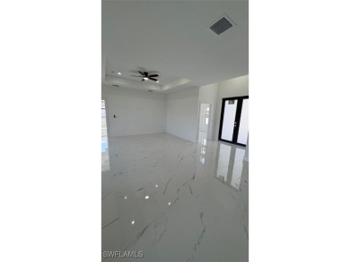 This stunning new construction features impact windows and doors - photo 3