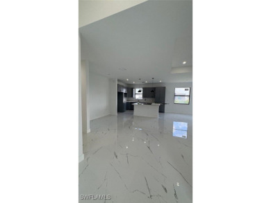 This stunning new construction features impact windows and doors - photo 4