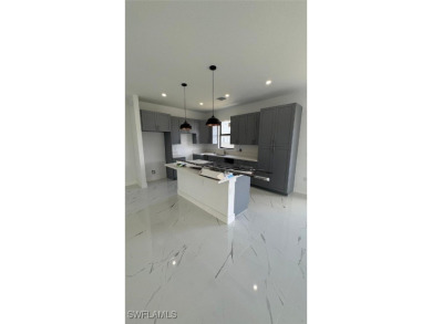 This stunning new construction features impact windows and doors - photo 5