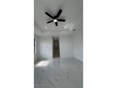 This stunning new construction features impact windows and doors - photo 9