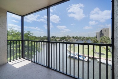 STUNNING WATER VIEWS! Rare private end-unit overlooking the - photo 1