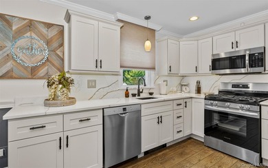 Pride of ownership shines throughout this Spectacular 3-bedroom - photo 3