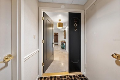 Move-in ready and tucked behind the secure, guarded gates of the - photo 44