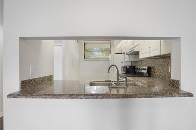 Best location in all of Lake Emerald! Ground floor, corner unit - photo 3