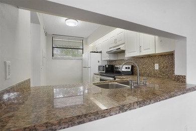 Best location in all of Lake Emerald! Ground floor, corner unit - photo 4