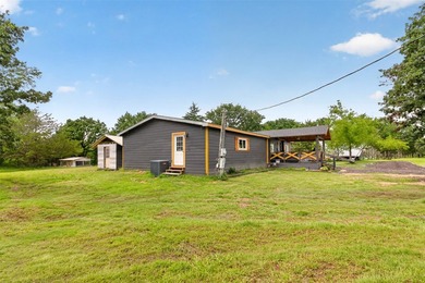 Beautifully remodeled manufactured home on 2.5 acres in Quinlan - photo 29