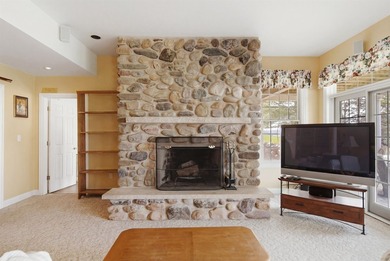 Perched along a pristine stretch of shoreline, this ideal lake - photo 34
