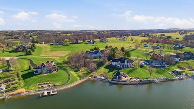 Perched along a pristine stretch of shoreline, this ideal lake - photo 39