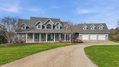 Perched along a pristine stretch of shoreline, this ideal lake - photo 43
