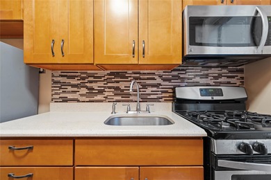 Welcome to your new home in the heart of Forest Hills! This