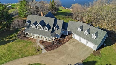 Perched along a pristine stretch of shoreline, this ideal lake - photo 44