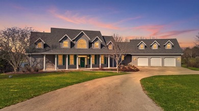 Perched along a pristine stretch of shoreline, this ideal lake - photo 49