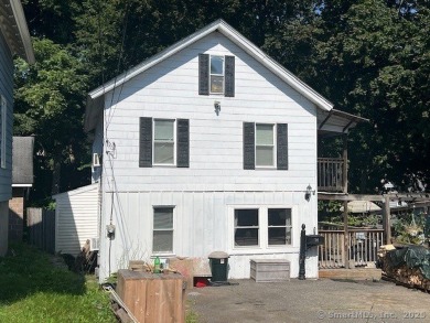 Don't let the outside fool you! Perfect alternative to - Lake Home For Sale in Winchester, Connecticut
