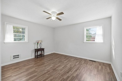 Welcome home to the charming 3-bedroom, 2-bath brick ranch on a