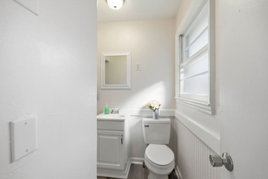 Welcome home to the charming 3-bedroom, 2-bath brick ranch on a