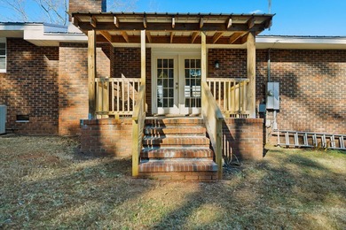 Welcome home to the charming 3-bedroom, 2-bath brick ranch on a