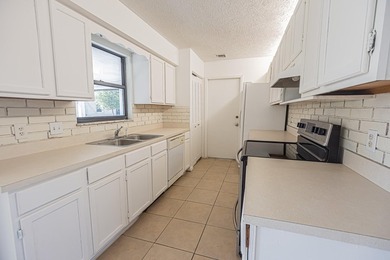Freshly updated and move-in ready, this 2BR + flex space, 2BA - photo 9