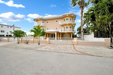 Experience elevated Florida Keys living at this exceptional - photo 3