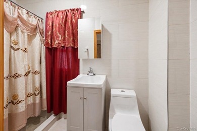 Two family home for sale in the Morris Park/ Van Nest area of - photo 8