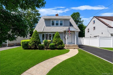 Welcome Home To This Charming Merrick Cape Cod Nestled Mid Block - photo 1