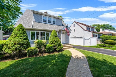 Welcome Home To This Charming Merrick Cape Cod Nestled Mid Block - photo 2