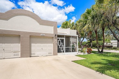Tucked away as a private end-unit in desirable Town Villas, this - photo 3