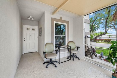 Tucked away as a private end-unit in desirable Town Villas, this - photo 4
