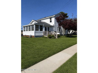 Charming 3-bedroom, 1-bath Colonial set on a desirable corner - photo 1