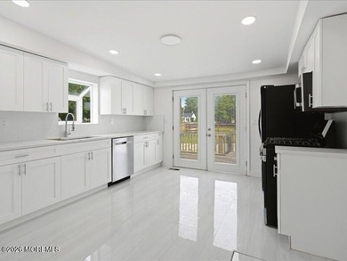 Charming 3-bedroom, 1-bath Colonial set on a desirable corner - photo 9
