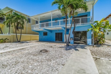 Rare opportunity to own a canal-front home directly on the - photo 3