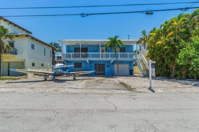 Rare opportunity to own a canal-front home directly on the - photo 5