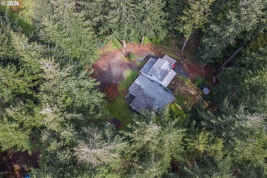 Tucked away on a private road in a charming coastal Oregon town - photo 6