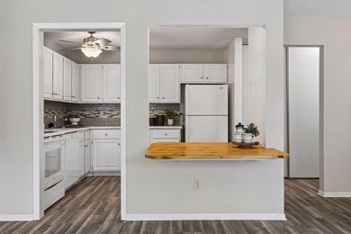 Welcome to this inviting end-unit townhome in the desirable - photo 11