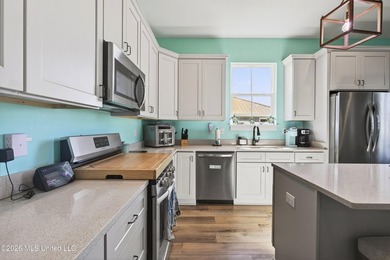 Beach views, double corner lot, and coastal charm without the - photo 12