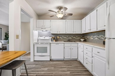 Welcome to this inviting end-unit townhome in the desirable - photo 12