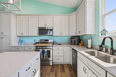 Beach views, double corner lot, and coastal charm without the - photo 13