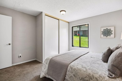 Welcome to this inviting end-unit townhome in the desirable - photo 18