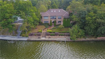 Huge executive lakefront home with fantastic views on the widest - Lake Home For Sale in Roaming Shores, Ohio