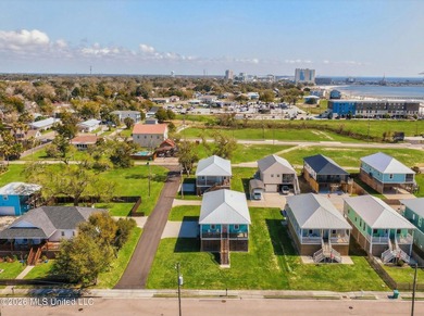 Beach views, double corner lot, and coastal charm without the - photo 30
