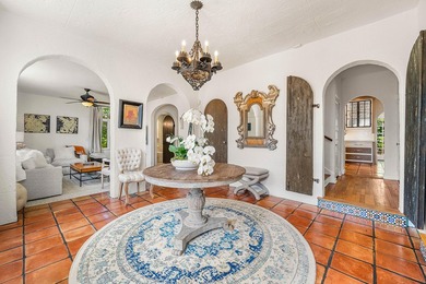 This iconic 1920's Mediterranean Revival Home blends historic - photo 2