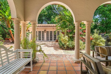This iconic 1920's Mediterranean Revival Home blends historic - photo 3