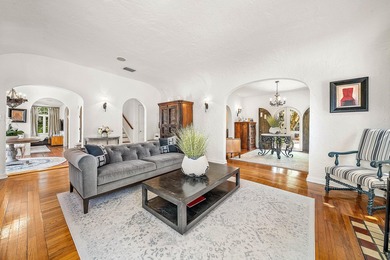 This iconic 1920's Mediterranean Revival Home blends historic - photo 7