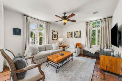 This iconic 1920's Mediterranean Revival Home blends historic - photo 8
