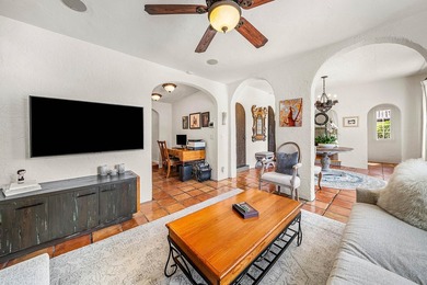 This iconic 1920's Mediterranean Revival Home blends historic - photo 9
